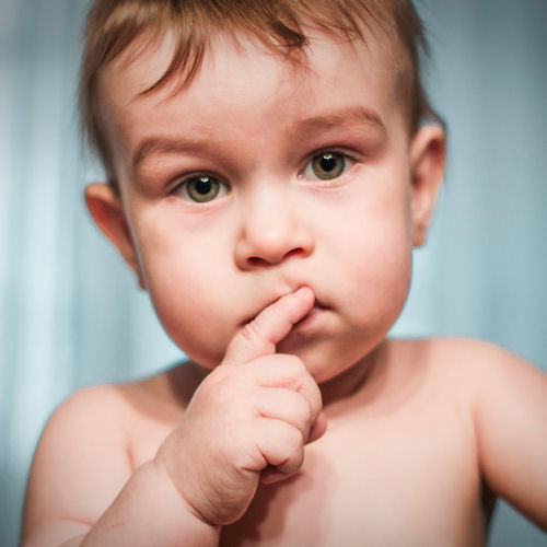 Six good reasons to hold a naming ceremony
photo of baby looking puzzled with finger to lips